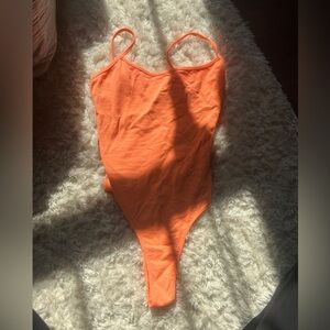 Orange bodysuit